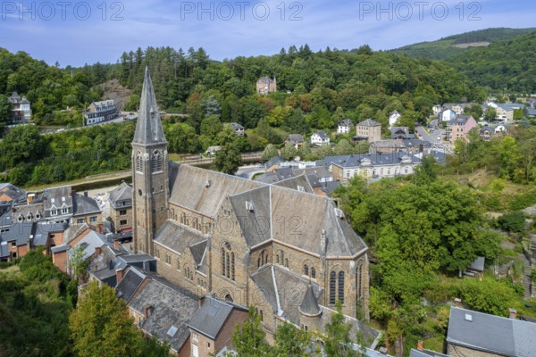 St. Nicholas Church seen from the castle ruins in the city La Roche-en-Ardenne in summer, province