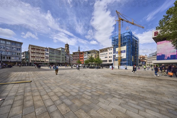 Square, general architecture, pavement slabs, construction site, scaffolding, crane, pedestrians as