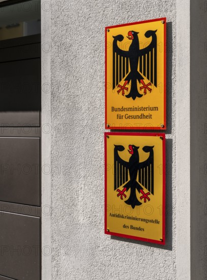 Yellow information signs, federal eagle with reference to federal ministries located there in the