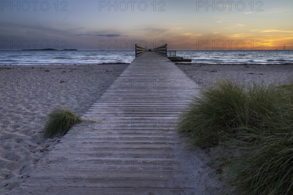 Spacious, empty beach with a pier, evening lighting, gentle sound of the sea, pier, Kobaek Strand,