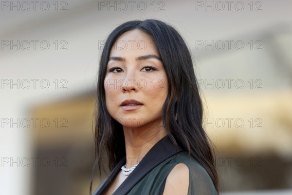 Venice, Italy - 2 September 2025: Greta Lee during the red carpet of - A house of Dynamite - during