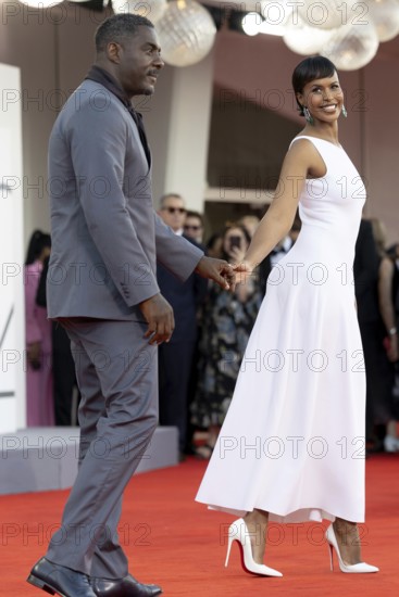 Venice, Italy - 2 September 2025: Idris Elba and Sabrina Dhowre Elba during the red carpet of - A