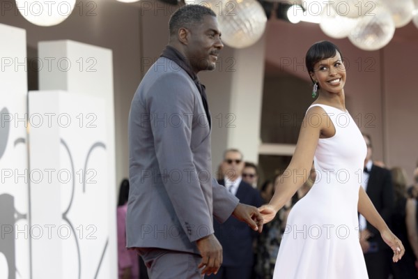 Venice, Italy - 2 September 2025: Idris Elba and Sabrina Dhowre Elba during the red carpet of - A