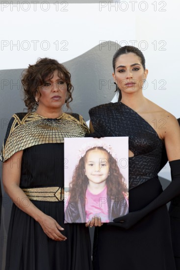 Venice, Italy - 3 September 2025: Kaouther Ben Hania and Saja Kilani with a portrait of