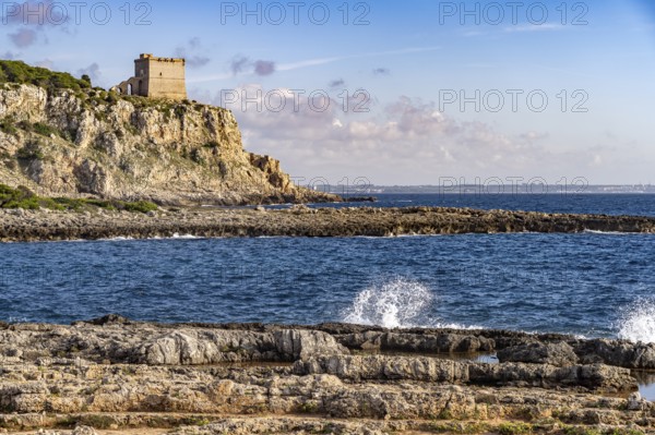 The Torre dell'Alto watchtower on the coast of the Porto Selvaggio nature reserve, Santa Caterina,