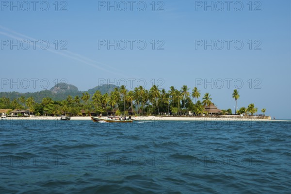 White sandy beach and coconut palms, Pearl Beach, Koh Mook, Trang Province, Southern Thailand,