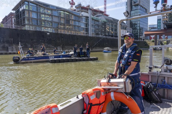 Multi-purpose boat of the THW during a training trip on the Rhine, Medienhafen in Düsseldorf, of