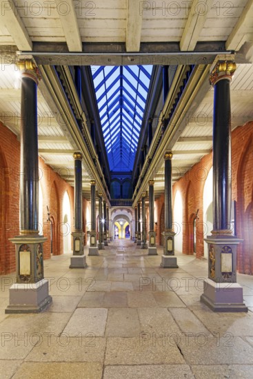 Night view, north-south passageway with columns and arcade gallery, two storeys, town hall