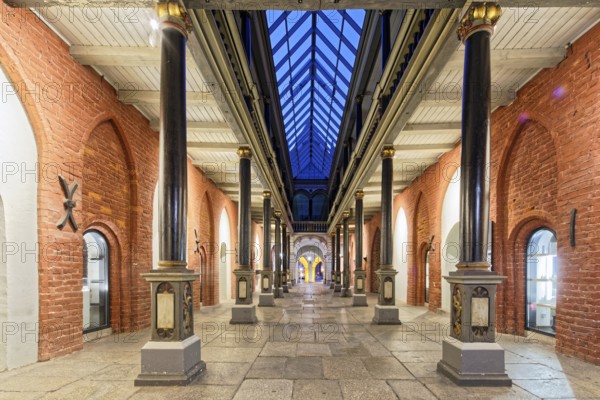 Night view, north-south passageway with columns and arcade gallery, two storeys, town hall