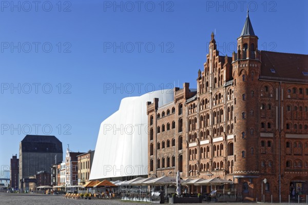 Front right, towered warehouse built in 1905 and warehouse II built in 1888, brick building, in