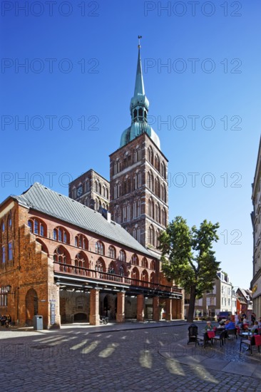 Rear towers St. Nikolai Church first mentioned in 1276, 102 metres high, in front town hall