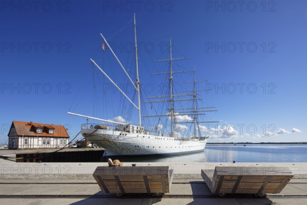 Woman with sun hat on a lounger, Gorch Fock, also Gorch Fock I, built in 1933 by Blohm & Voss for