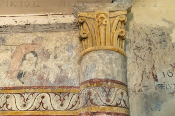Saint Jean Chapel features ancient wall paintings showcasing religious figures with vibrant colors