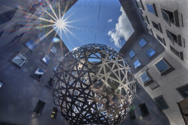 Steel sphere, Sphere, a work of art by Ólafur Eliasson, Fünf Höfe shopping arcade, Munich, Bavaria,