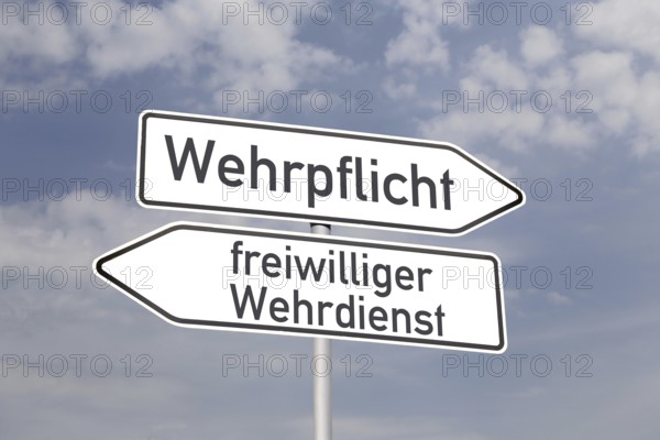 (Photomontage) Directional arrows pointing in the directions of MANDATORY DEFENCE and VOLUNTARY