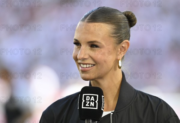 DAZN presenter Laura Wontorra, smiling in interview microphone microphone logo portrait,