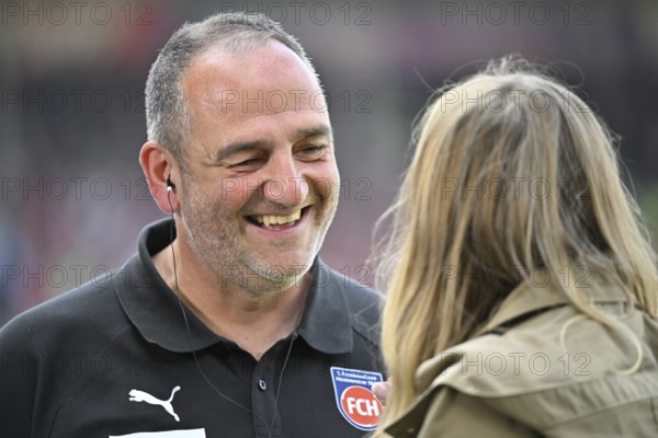 Coach Frank Schmidt 1. FC Heidenheim 1846 FCH in an interview smiles Voith-Arena, Heidenheim,