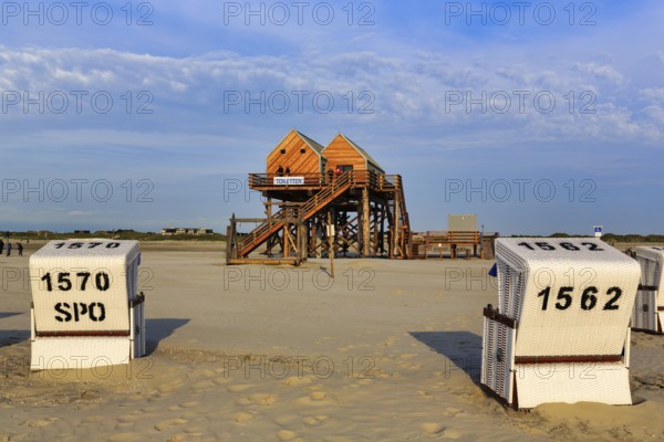 Pile dwelling, toilet house on the beach, beach chairs, Sankt Peter-Ording, Eiderstedt peninsula,
