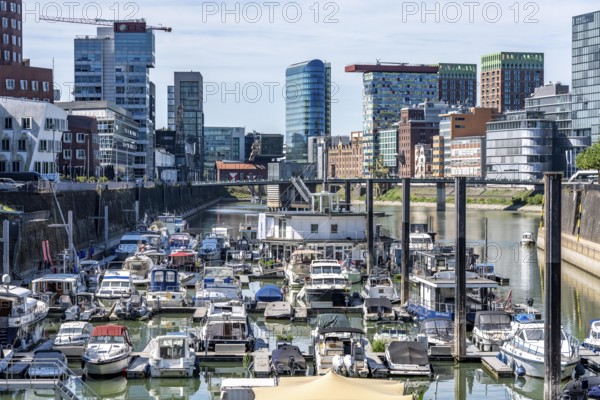 Marina in Düsseldorf's Media Harbour, old and modern architecture in the former harbour, a mixture