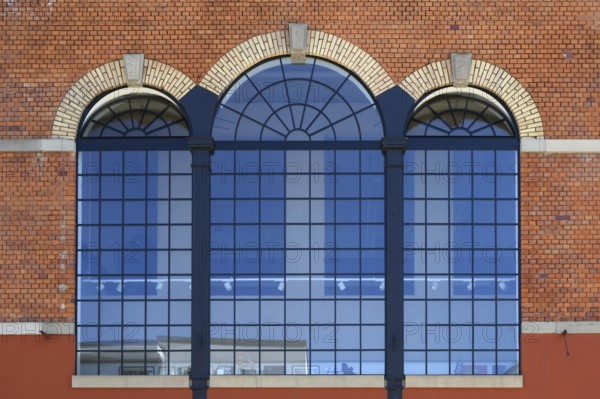 Former factory windows of a brewery boiler house, today artist Stefan Schrumbel's studio,