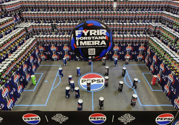 Football stadium built from beverage cans for the European Women's Championship in the supermarket,