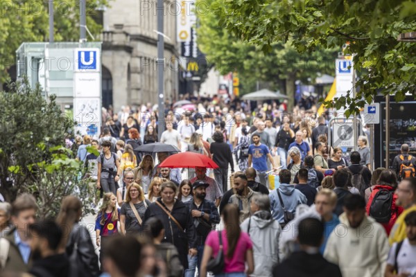 Crowd on the way in the shopping street. Königstraße pedestrian zone in Stuttgart,