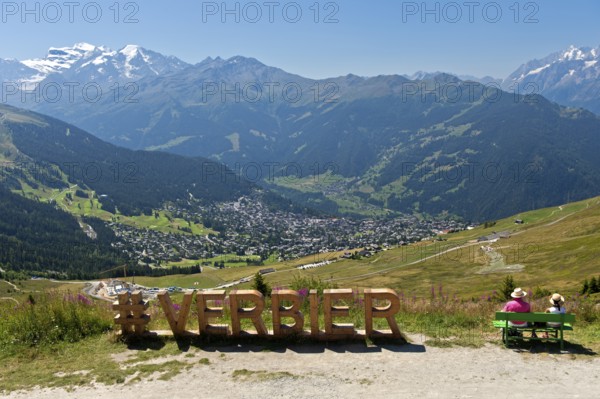 View from the Col de la Croix de Cœur pass to the village of Verbier and the glaciated mountain