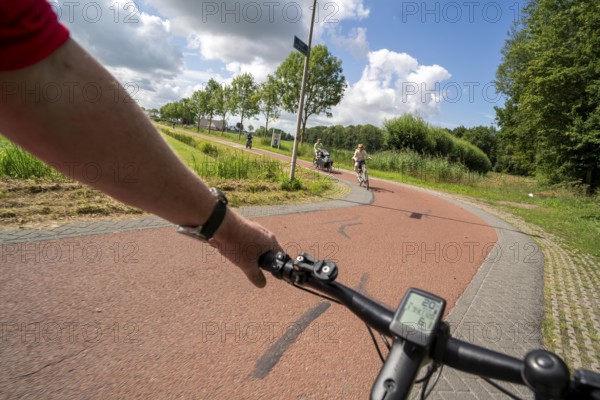 Cycling south of Utrecht, long-distance cycle path to Houten, around 50, 000 people live here and