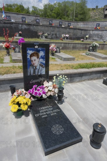 Single grave with portrait and floral decoration, memorial, grave of 2020, victim of the war
