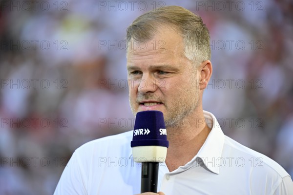 Board Member for Sport Fabian Wohlgemuth VfB Stuttgart Portrait in interview Microphone Microphone