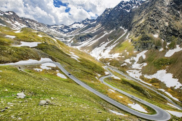 Highest last serpentines hairpin bends tight bends in front of pass summit of mountain pass alpine