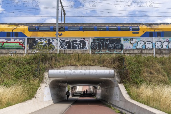 Cycle path in the north of Nijmegen, subway of the railway line, wide cycle path, Netherlands