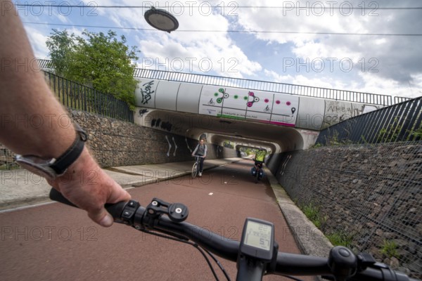 Rijnwaalpad long-distance cycle path, near the village of Elst, subway of the A15 motorway, wide