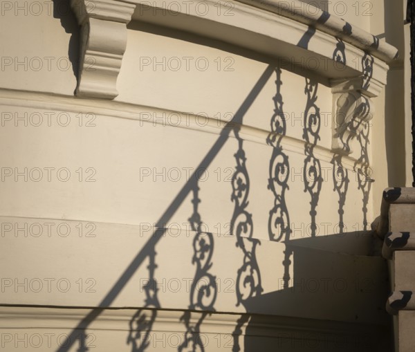Shadow of an artistically decorated banister on a house wall, Notting Hill, London, England, Great