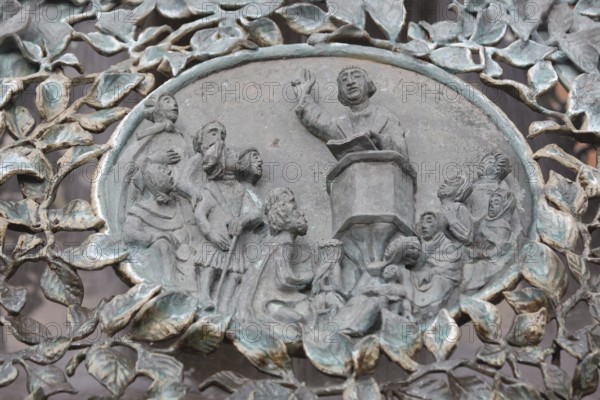 Bugenhagen Fountain by Ulrich Henn 1995 with sermon by pastor to the congregation, people, speak,