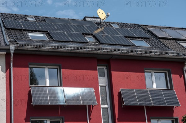 Residential building with photovoltaic modules on the façade and roof, North Rhine-Westphalia,