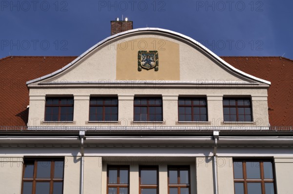 Blaumännle, heraldic figure, town coat of arms, logo, front of the primary school, Blaubeuren,