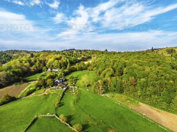 Farms over Coniston Water from drone, Lake District National Park, Cumbria, UK
