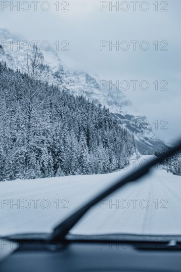 Winter road trip on the Icefields Parkway with lots of snow and ice, Banff National Park, Jasper