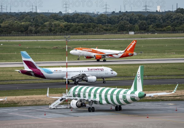 Düsseldorf Airport, Condor Airbus A321-200, aircraft on the apron, Eurowings Airbus on the taxiway