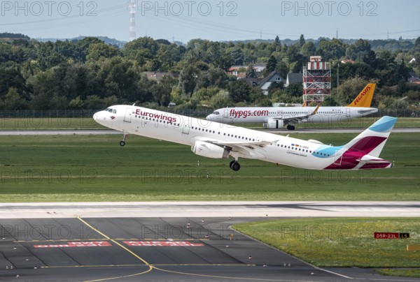 Düsseldorf Airport, Eurowings Airbus A321-231 on take-off, Flypgs.com, Pegasus aircraft after