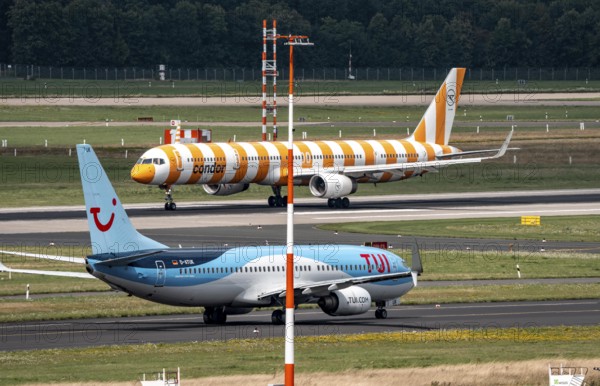 Düsseldorf Airport, Condor Airbus on take-off, TUIFly Boeing 737 on the way to take-off, North