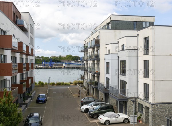 Modern apartment housing in old docks area, Trinity Street, Millbay marina village development,