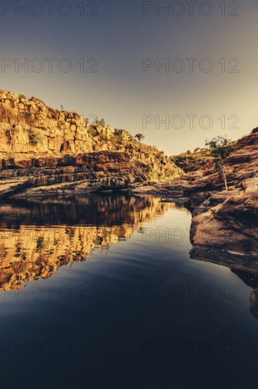 Bell Gorge waterfall, a body of water in north-west Australia in the Kimberley. Sunrise in the