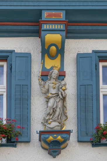 Statue of the Virgin Mary on a house, Biberach an der Riß, Baden-Württemberg, Germany