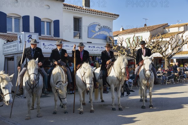 Guardians of the Camargue, traditional shepherds, riders on Camargue horses, pilgrimage, procession
