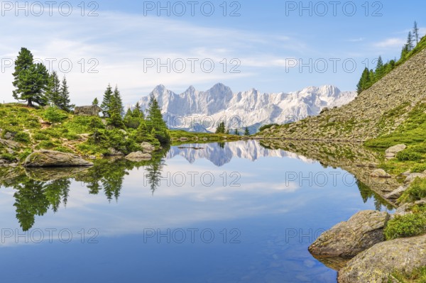 Mirror lake with view to the Dachstein, reflection, mountains, Dachstein massif, Reiteralm,