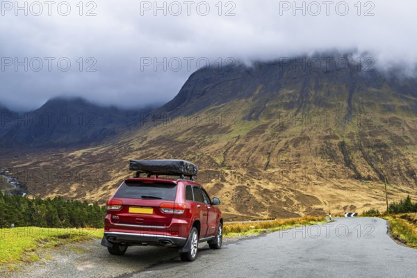 Off road 4x4 car with roof tent on Fairy Pools and Waterfalls, Glen Brittle, Black Cuillin, Isle of
