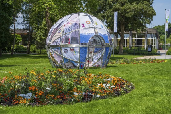 Park in front of the entrance to the garden show, walk-in sphere, pavilion, Bad Lippspringe,