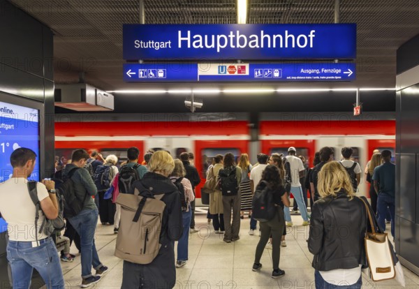Stuttgart main station with S-Bahn. People on the platform waiting for their train. Stuttgart,
